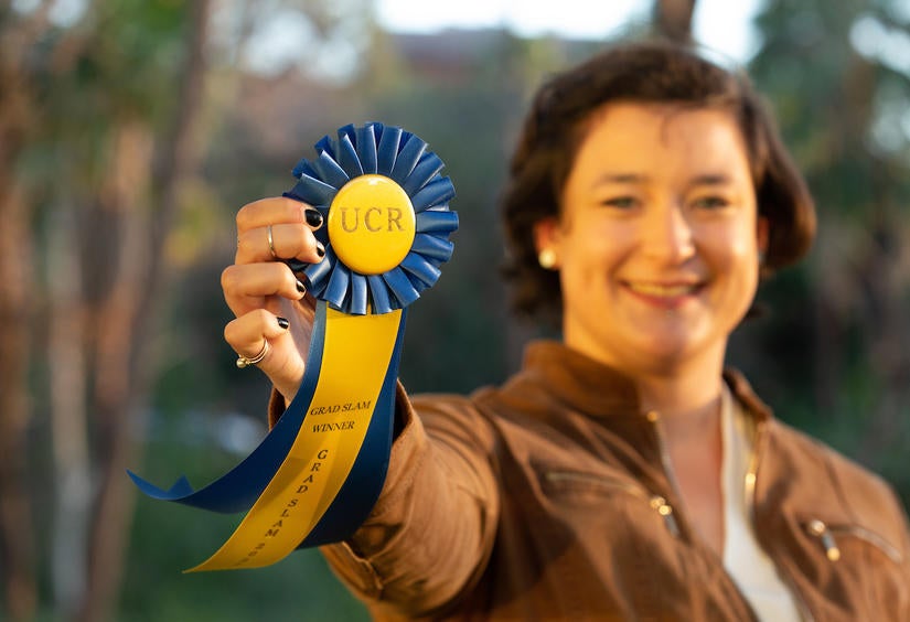 Claire Whitaker, botany and plant sciences doctoral student and first place winner of the Grad Slam competition, on Thursday, March 3, 2022, at the Alumni and Visitor Center at UC Riverside.  (UCR/Stan Lim)